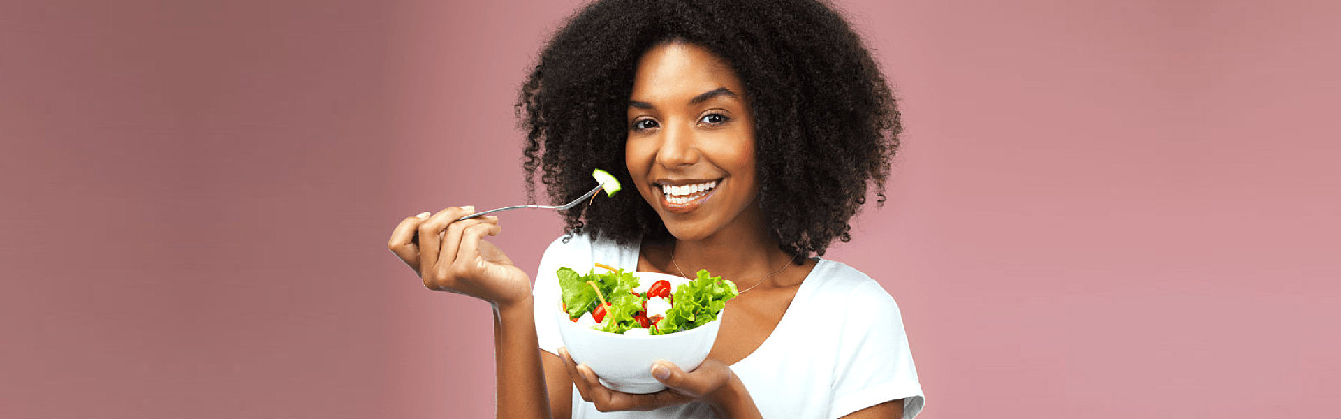 woman eating healthy vegetable salad